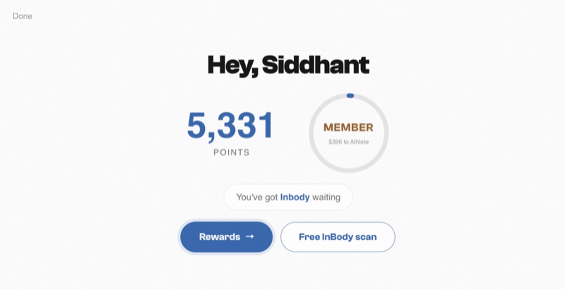 The founding store's live check-in kiosk welcome screen, prompting members to enter their phone number
